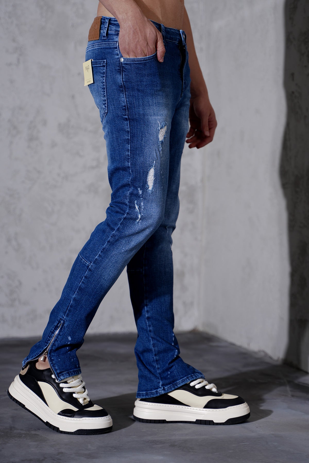 Jean bleu foncé homme avec zip chevilles – Coupe droite effet usé